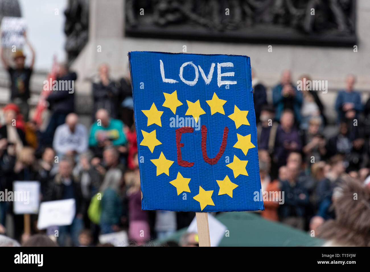 London, UK. 23rd Mar, 2019. Peoples Vote March, Love EU placard, bright,cheerful. Crowd detail and banners as taken from the perspective of a protester. Remain banners, second referendum. Credit: Tony Pincham/Alamy Live News Stock Photo