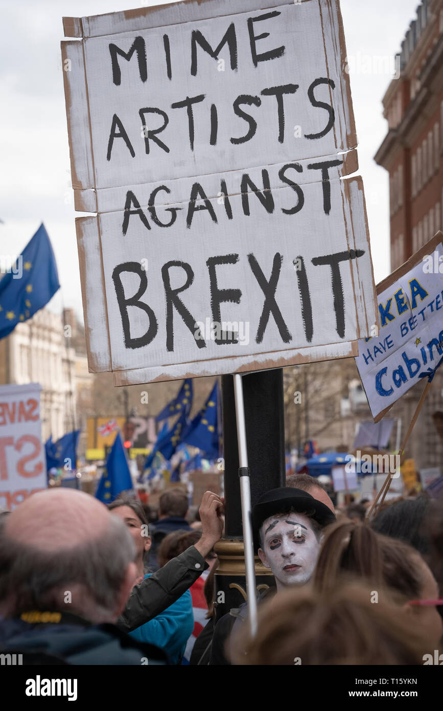 London, UK. 23rd Mar, 2019. Peoples Vote March, MIME Artists against Brexit placard, humour. Crowd detail and banners as taken from the perspective of a protester. Remain banners, second referendum. Credit: Tony Pincham/Alamy Live News Stock Photo