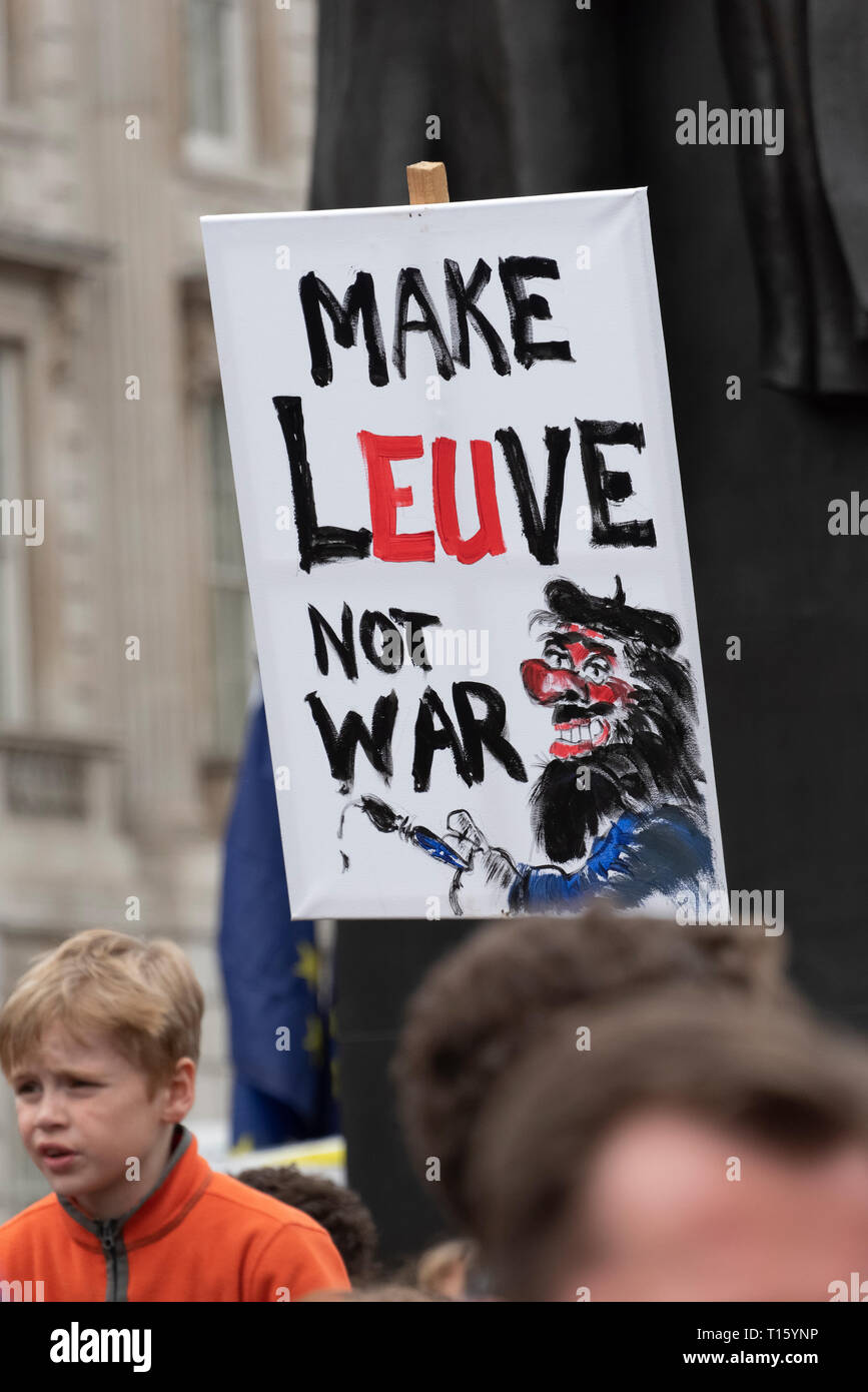 London, UK. 23rd Mar, 2019. Peoples Vote March, Make L-EU-VE not WAR placard. Crowd detail and banners as taken from the perspective of a protester. Remain banners, second referendum. Credit: Tony Pincham/Alamy Live News Stock Photo