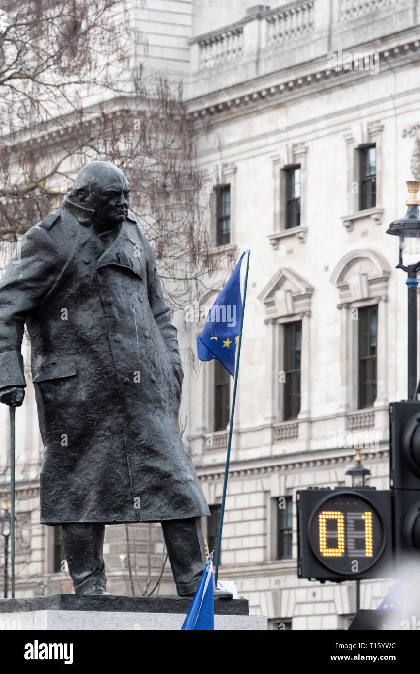 London, UK. 23rd Mar, 2019. Peoples Vote March, Churchill statue EU flags - ponderous. Crowd detail and banners as taken from the perspective of a protester. Remain banners, second referendum. Credit: Tony Pincham/Alamy Live News Stock Photo