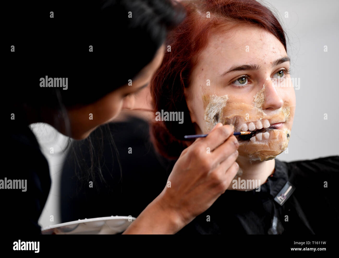 Berlin, Germany. 23rd Mar, 2019. At the 'Walker Stalker Con' in the Messe Berlin, Bara has herself painted as a zombie. At the meeting for fans of the series 'Game of Thrones' and 'The Walking Dead' fans can meet their idols. Credit: Britta Pedersen/dpa-Zentralbild/dpa/Alamy Live News Stock Photo