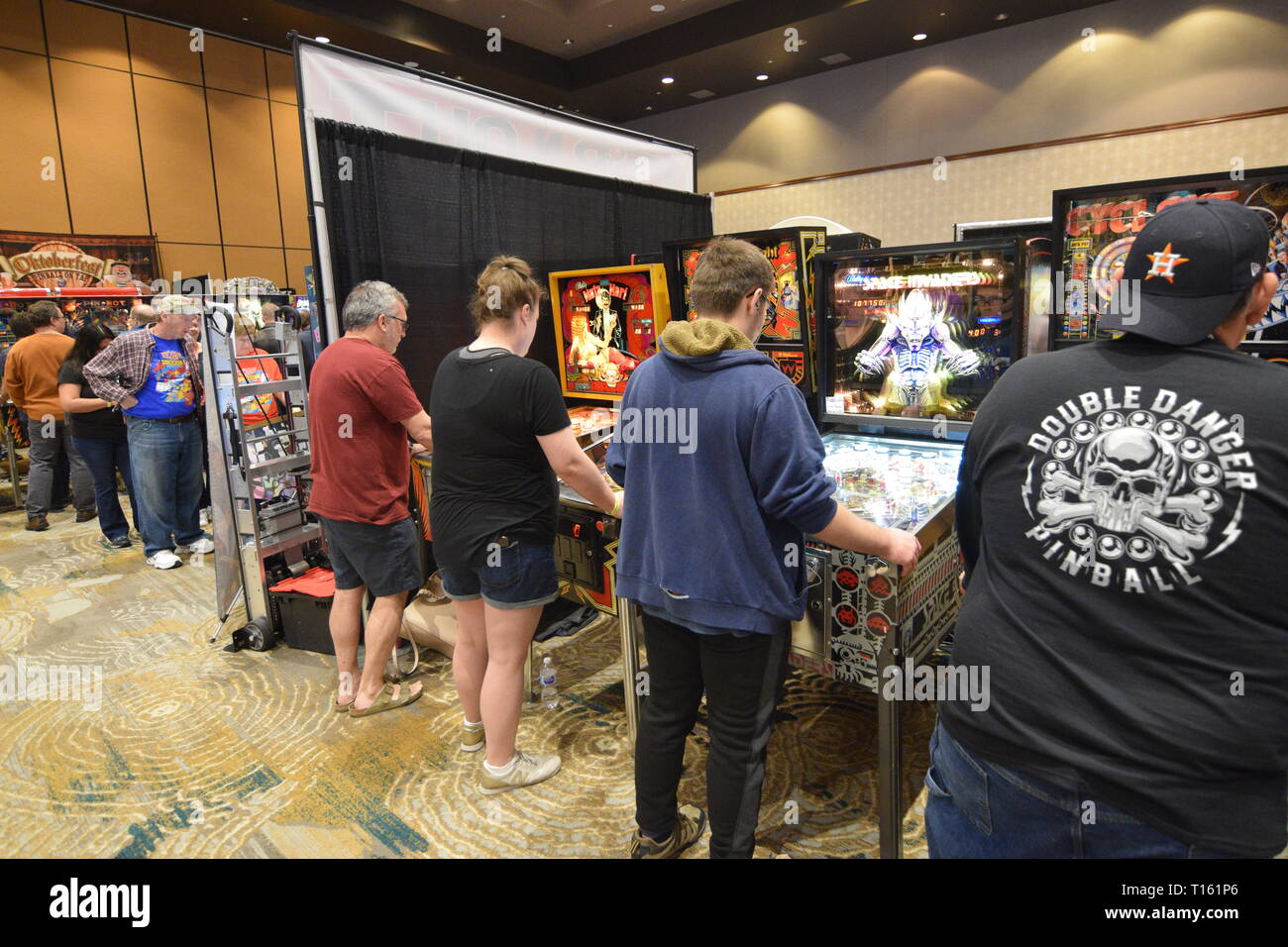Frisco, USA. 23rd March, 2019. Pinball enthusiasts playing games at the
