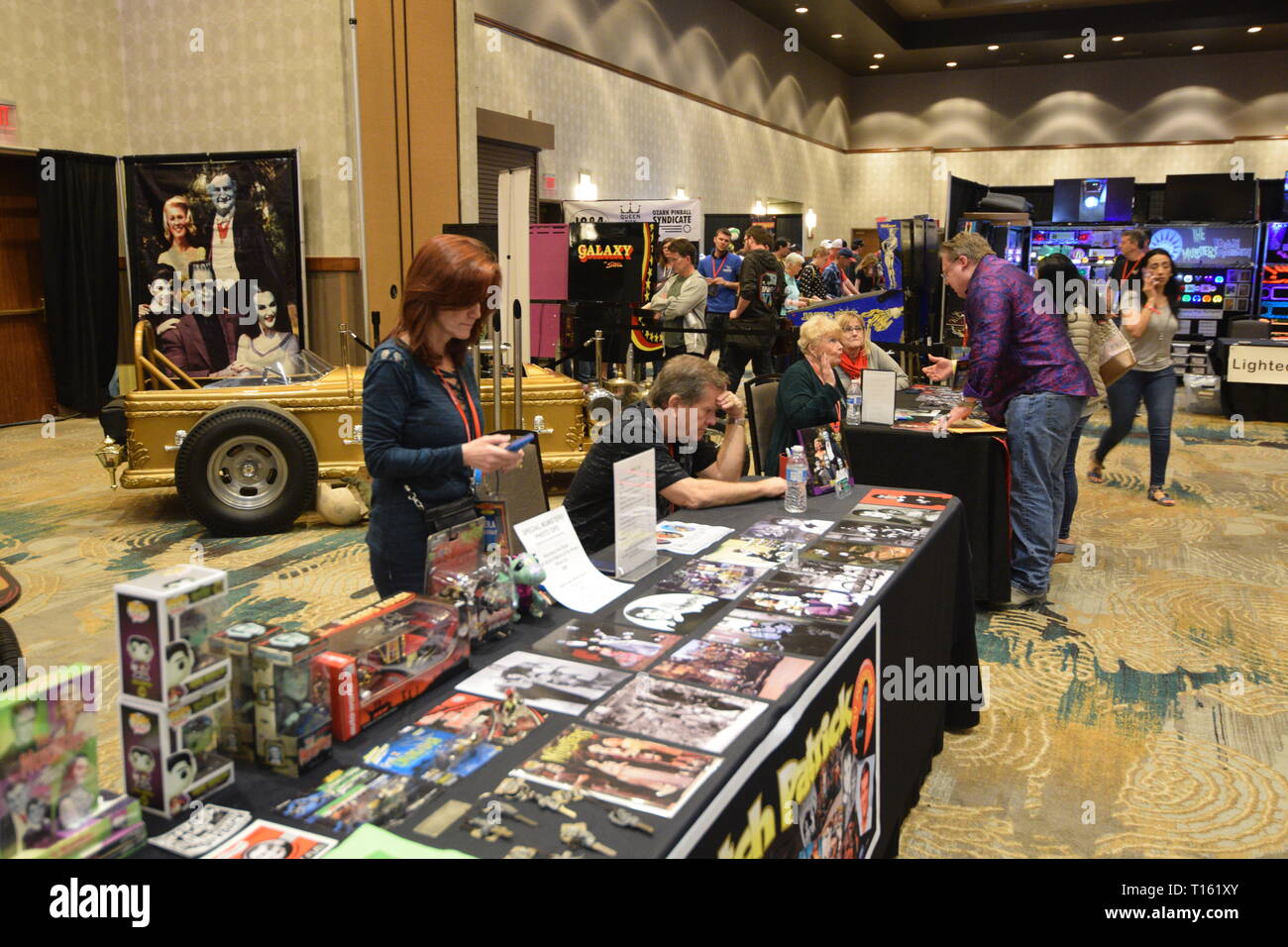 Frisco, USA. 23rd March, 2019.  Butch Patrick and Pat Priest, stars from The Munsters television program, await autograph seekers at the Texas Pinball Festival at the Embassy Suites Dallas – Frisco Hotel and Convention Center. Credit: Mariana Fernandez/Alamy Live News Stock Photo