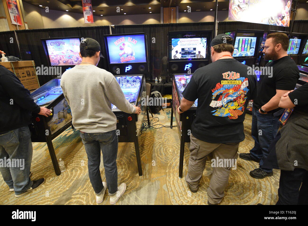 Frisco, USA. 23rd March, 2019. Pinball enthusiasts playing games at the