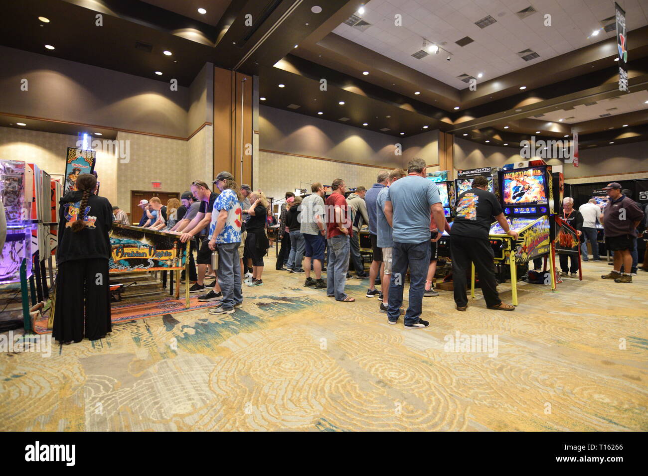 Frisco, USA. 23rd March, 2019. Pinball enthusiasts playing games at the