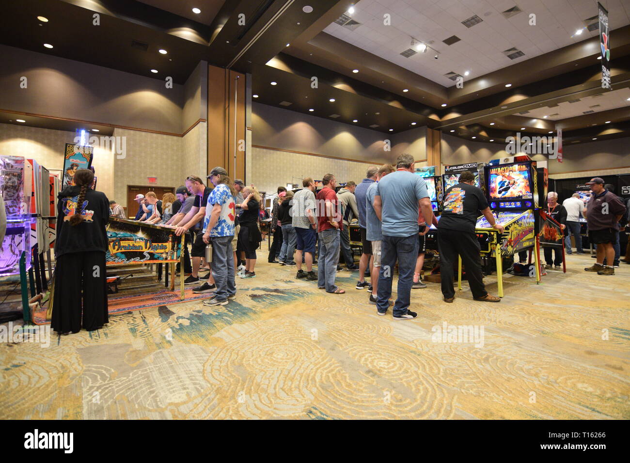 Frisco, USA. 23rd March, 2019.  Pinball enthusiasts playing games at the Texas Pinball Festival at the Embassy Suites Dallas – Frisco Hotel and Convention Center. Credit: Mariana Fernandez/Alamy Live News Stock Photo