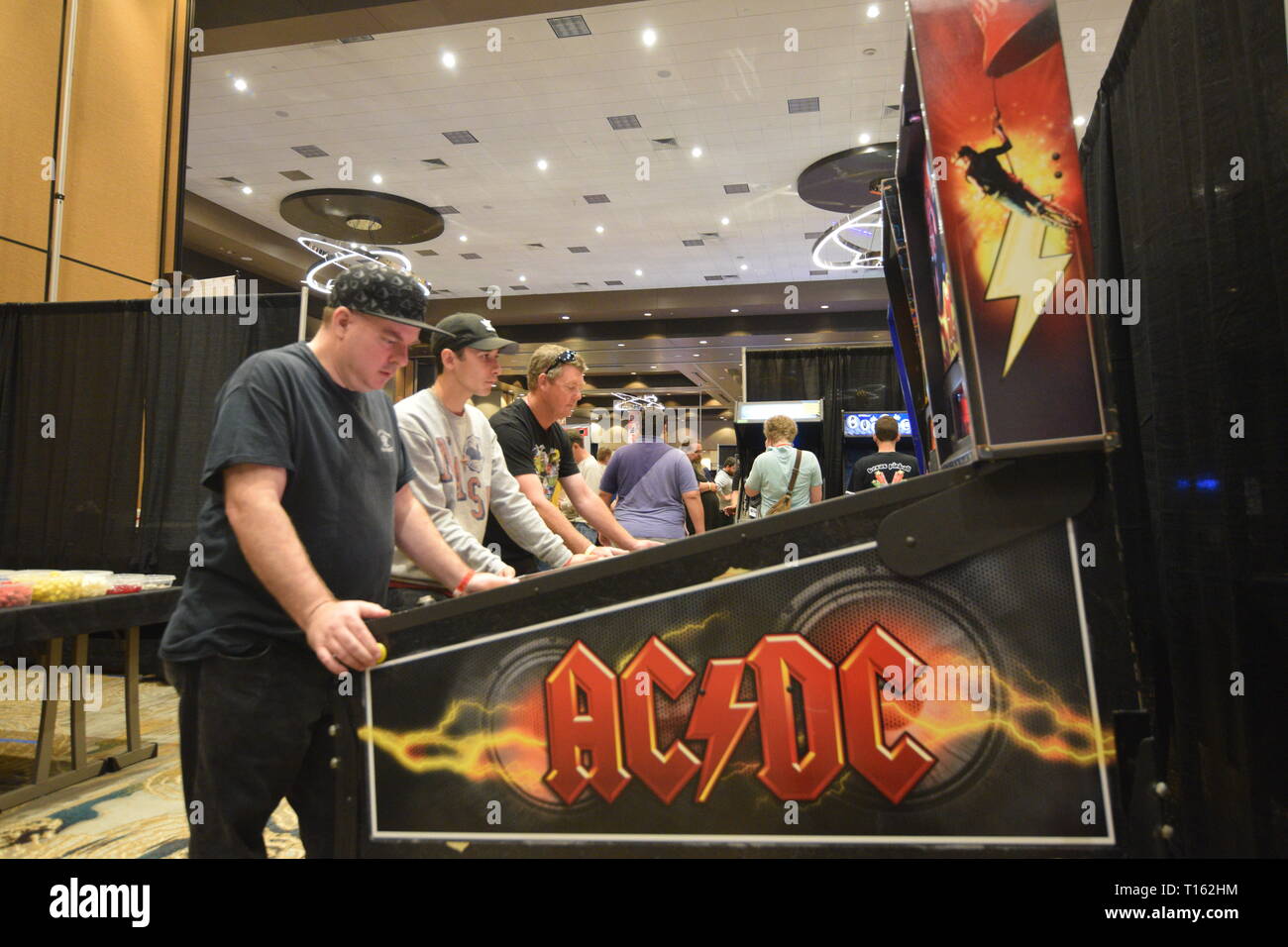 Frisco, USA. 23rd March, 2019. Pinball enthusiast playing the AC/DC