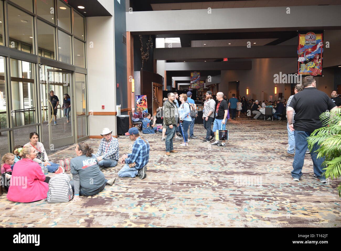 Frisco, USA. 23rd March, 2019. Pinball enthusaists take a rest in the