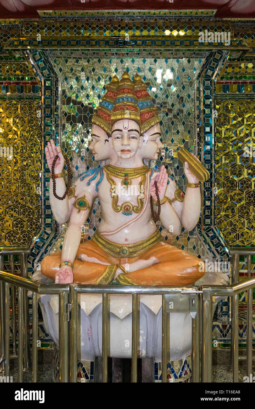 The unique Arulmigu Sri Rajakaliamman Glass Temple in Johor Bahru, Malaysia. The interior is completely covered in glass tiles. Icon detail. Stock Photo
