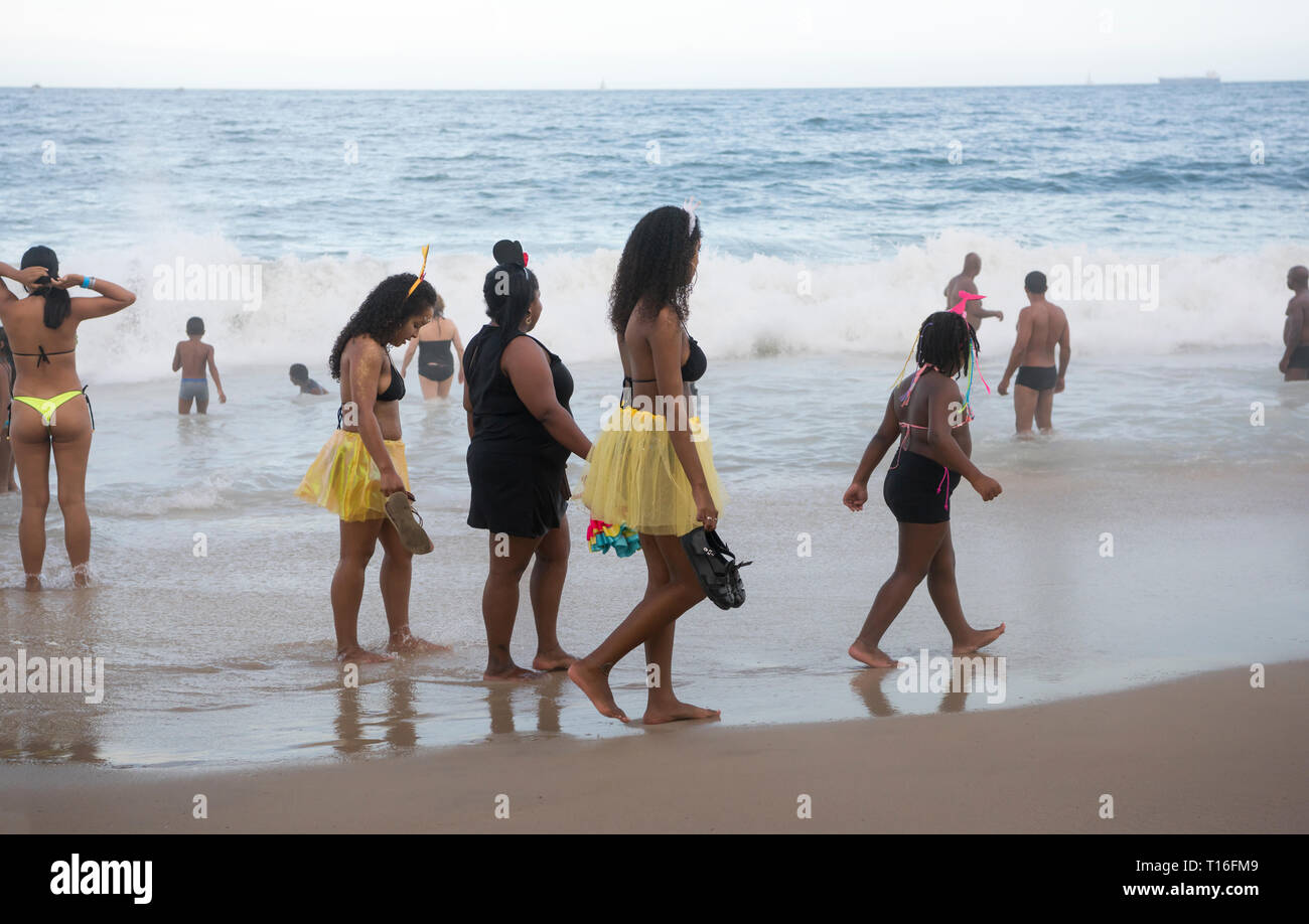 Rio de Janeiro, Brasil- March 05,2019: Girls in carnival costumes are on  Copacabana beach.Citizens swimming in the ocean Stock Photo - Alamy
