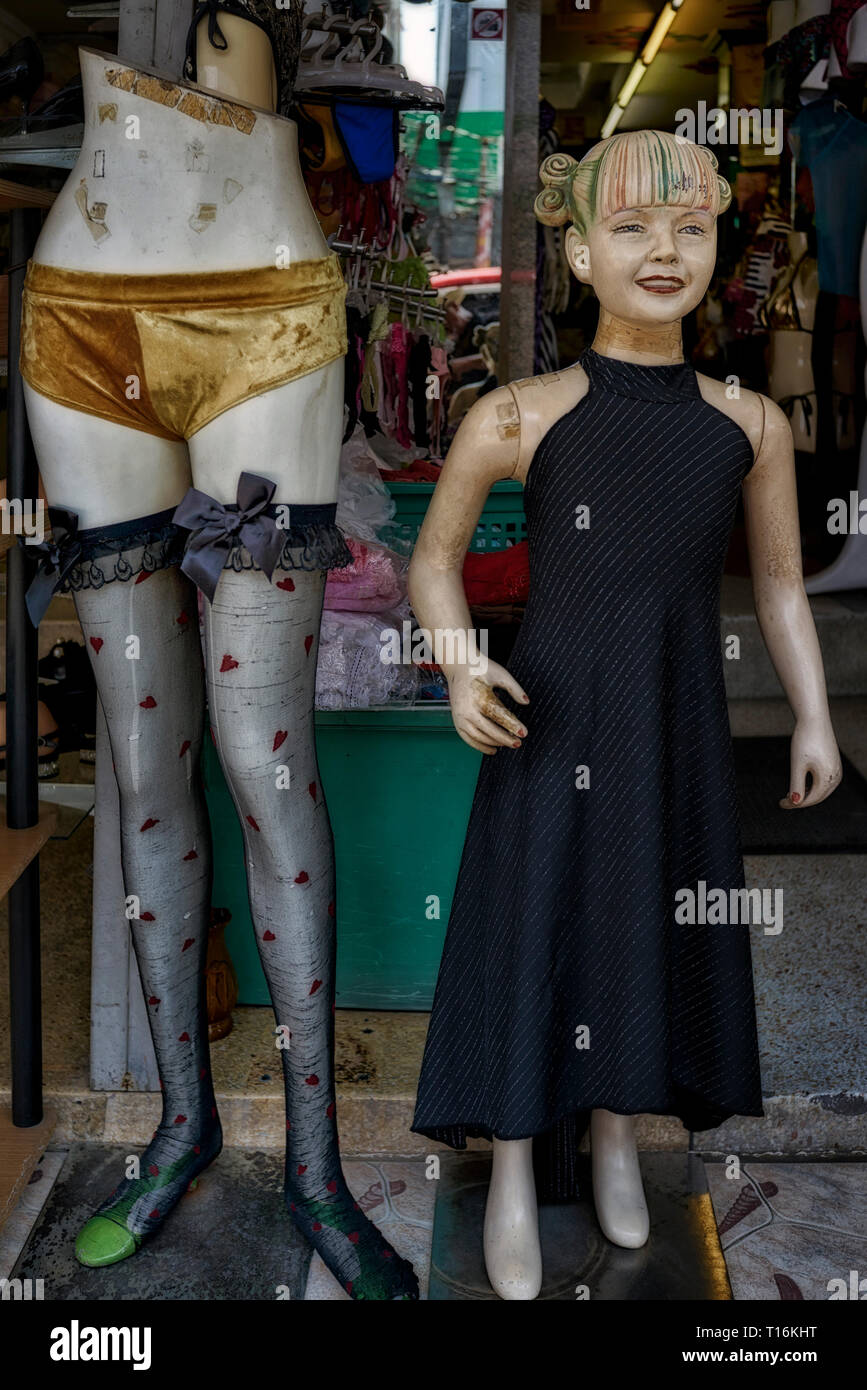 Mannequins at a Thailand woman's clothes shop catering for young and adult females. Big sister little sister attire Stock Photo
