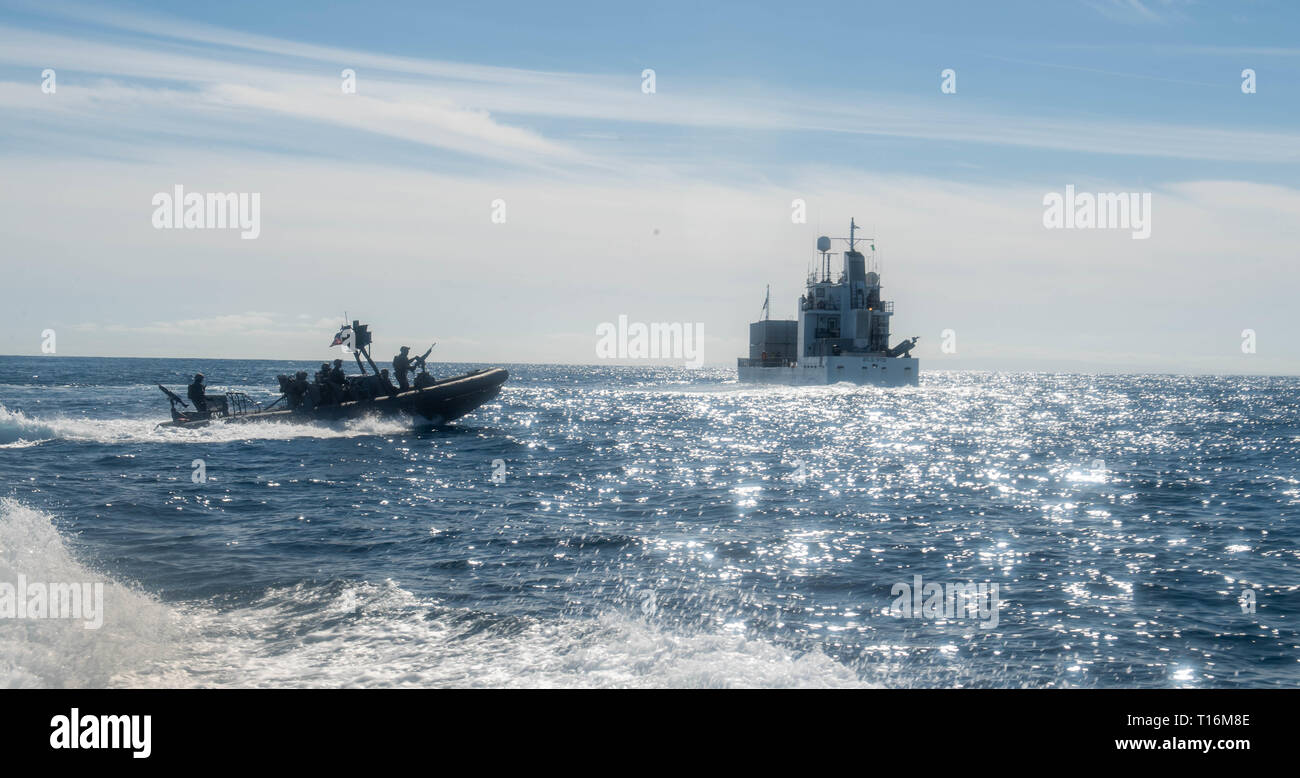 190322-N-HD110-0548  PACIFIC OCEAN (March 22, 2019) Sailors assigned to Assault Craft Unit (ACU) 1 transit to motor vessel MV ATLS-9701 during a visit, board, search, and seizure (VBSS) exercise conducted by VBSS team attached to the Harpers Ferry-class amphibious dock landing ship USS Harpers Ferry (LSD 49). Harpers Ferry is underway conducting routine operations as a part of USS Boxer Amphibious Ready Group (ARG) in the eastern Pacific Ocean. (U.S. Navy photo by Mass Communication Specialist 3rd Class Danielle A. Baker) Stock Photo