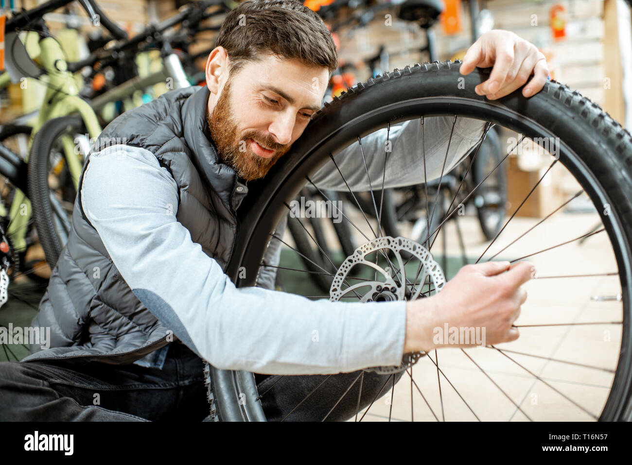 Man hug bike hi-res stock photography and images - Alamy