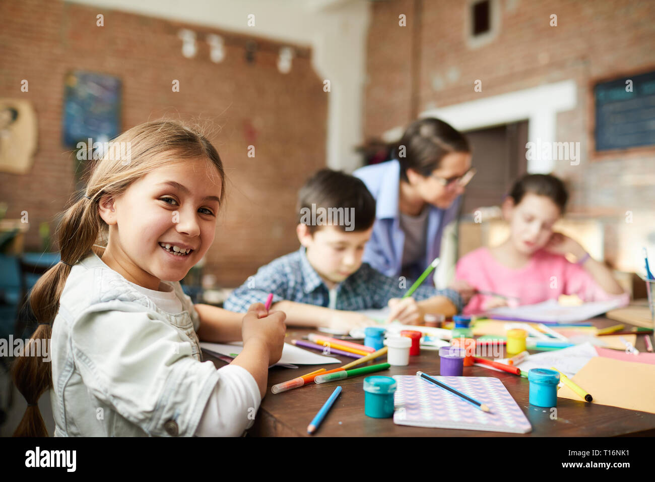 Little Girl Having Fun in Art Class Stock Photo