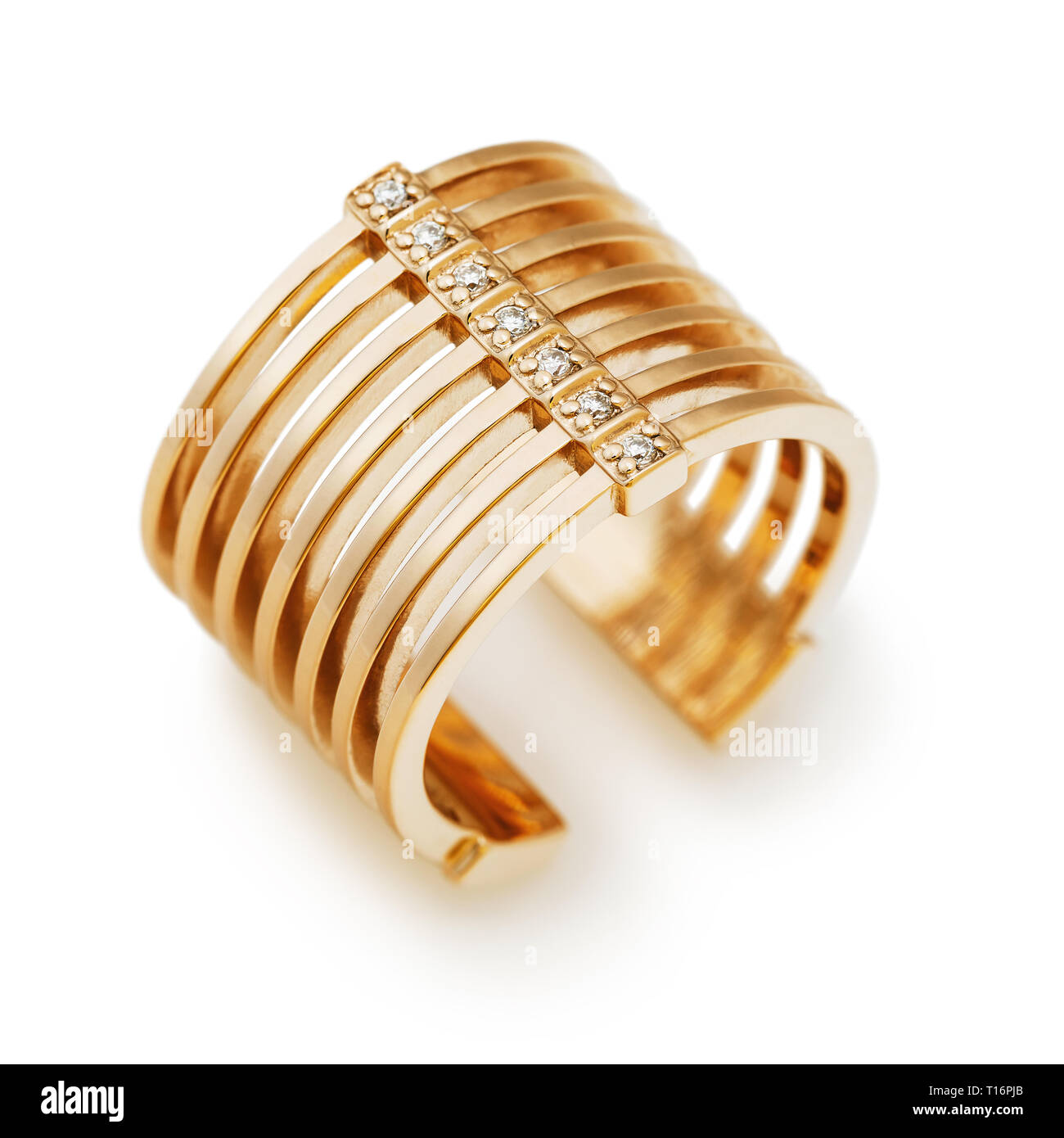 Golden ring with small stones isolated on white background Stock Photo