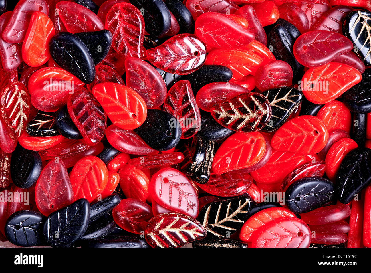 Background from colored shiny decorative leaves close-up. Stock Photo