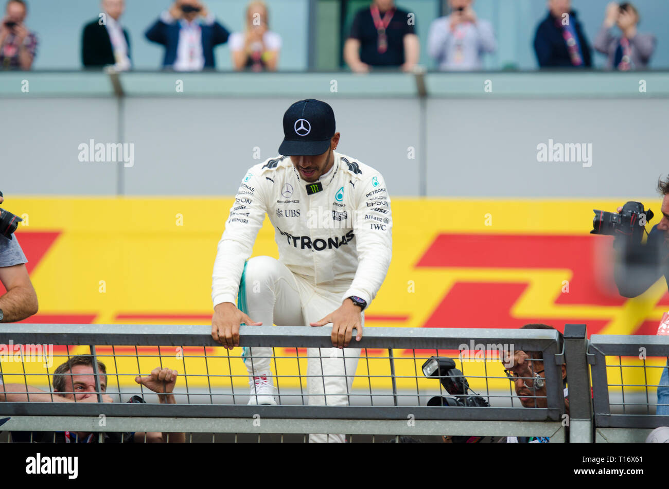 Lewis Hamilton celebrating after winning the British F1 Grand Prix at