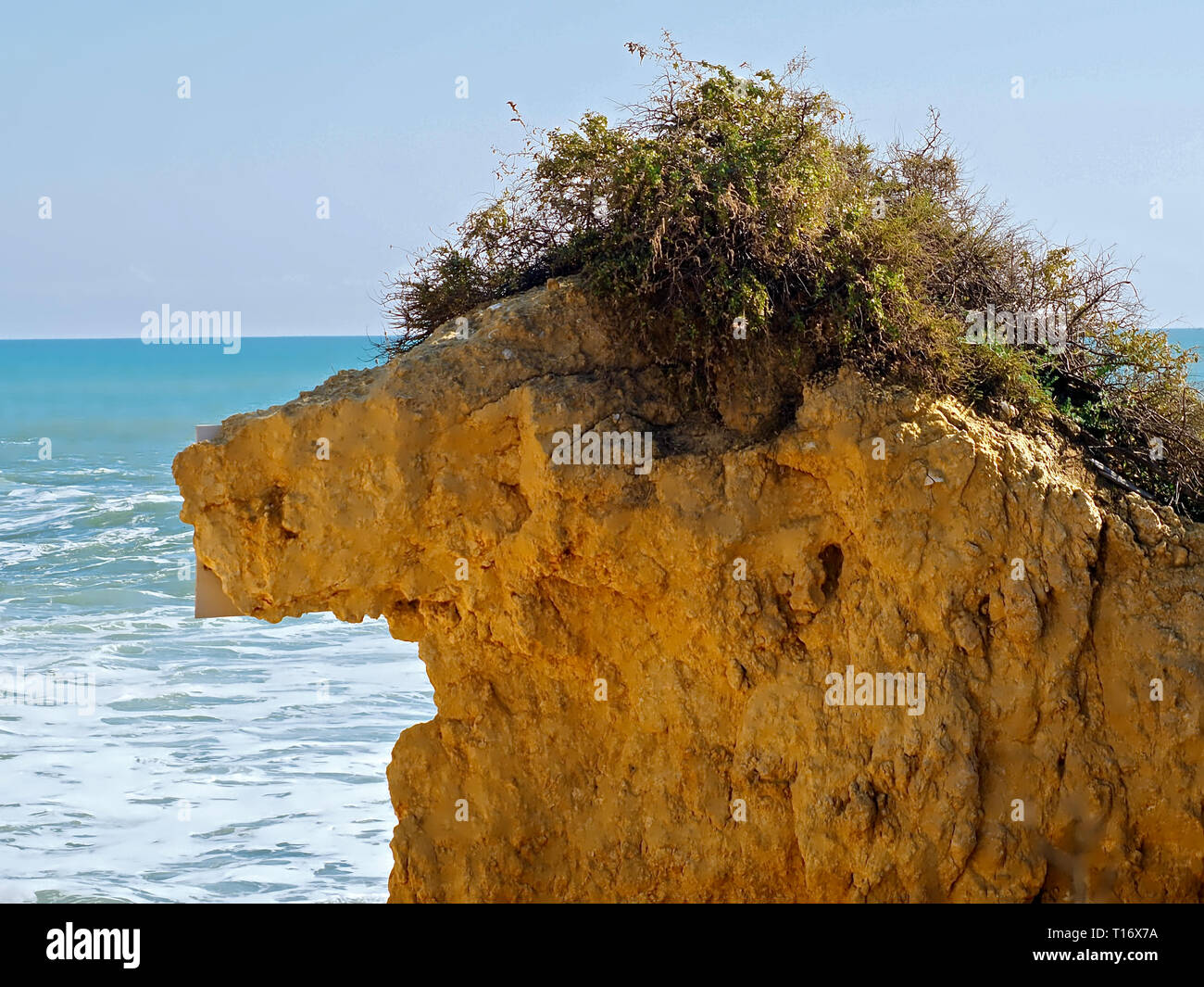 Rock in the shape of the famous figure Alf in front of blue ocean Stock ...