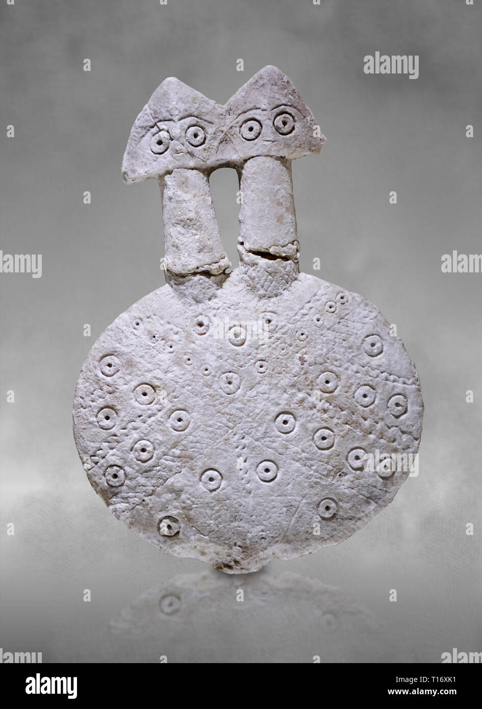 Bronze Age Anatolian two headed disk shaped alabaster Goddess figurine - 19th to 17th century BC - Kültepe Kanesh - Museum of Anatolian Civilisations, Stock Photo