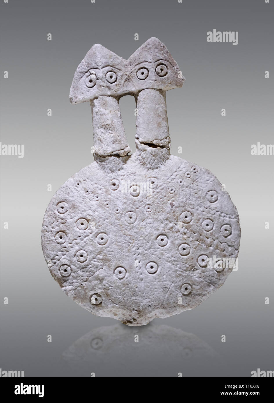 Bronze Age Anatolian two headed disk shaped alabaster Goddess figurine - 19th to 17th century BC - Kültepe Kanesh - Museum of Anatolian Civilisations, Stock Photo