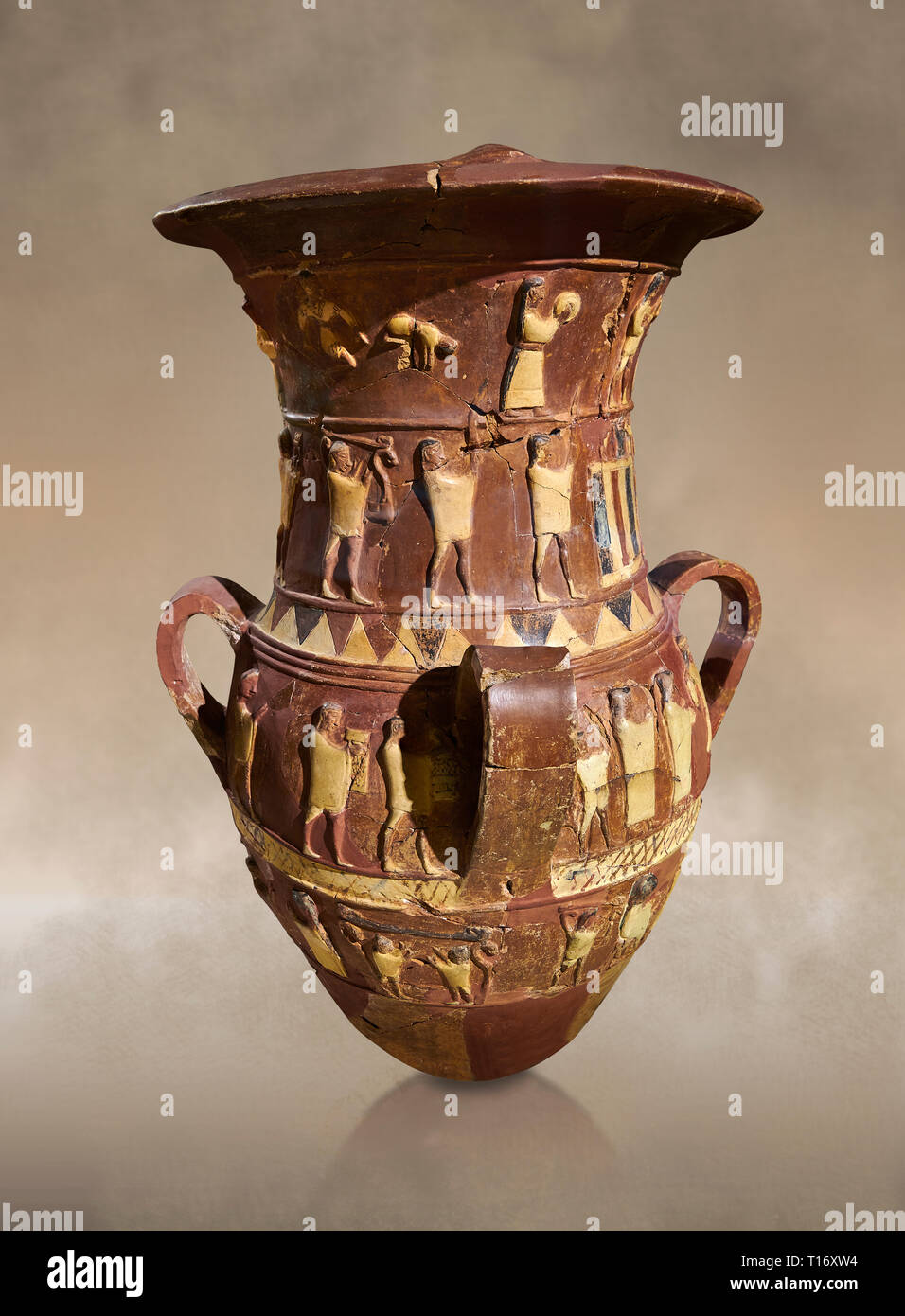 Inandik Hittite relief decorated cult libation vase with four decorative friezes featuring figures coloured in cream, red and black. The processional Stock Photo