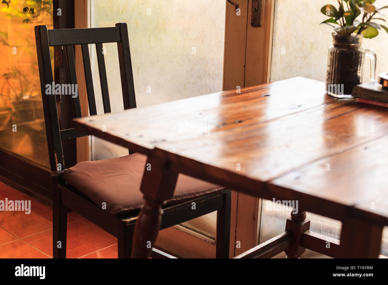 Rustic Wooden Table And Chairs With Warm Natural Light