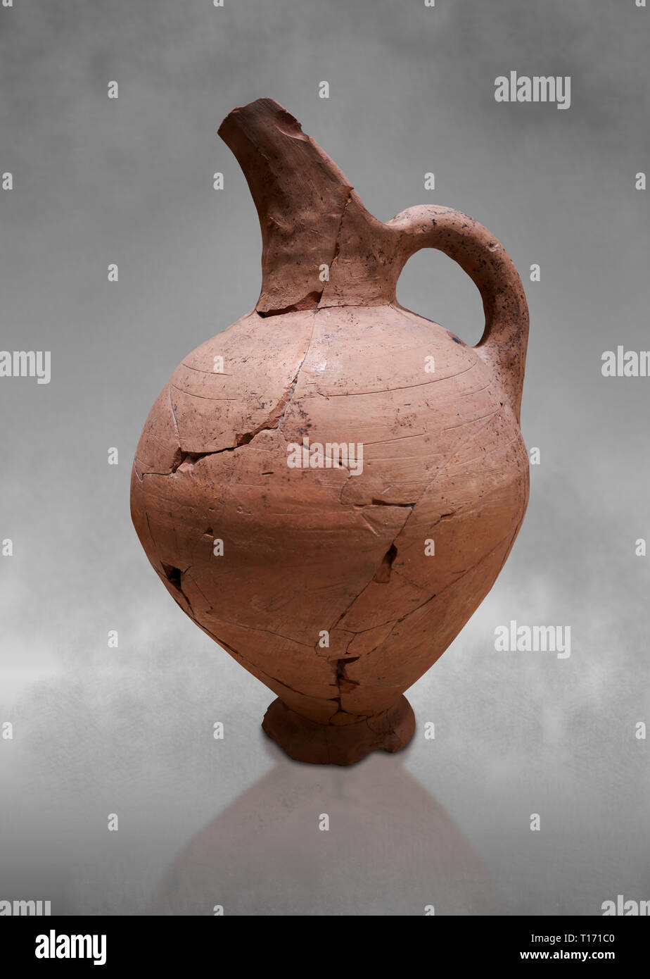 Hittite terra cotta beak spout pitcher . Hittite Period, 1600 - 1200 BC.  Hattusa Boğazkale. Çorum Archaeological Museum, Corum, Turkey. Against a gre Stock Photo
