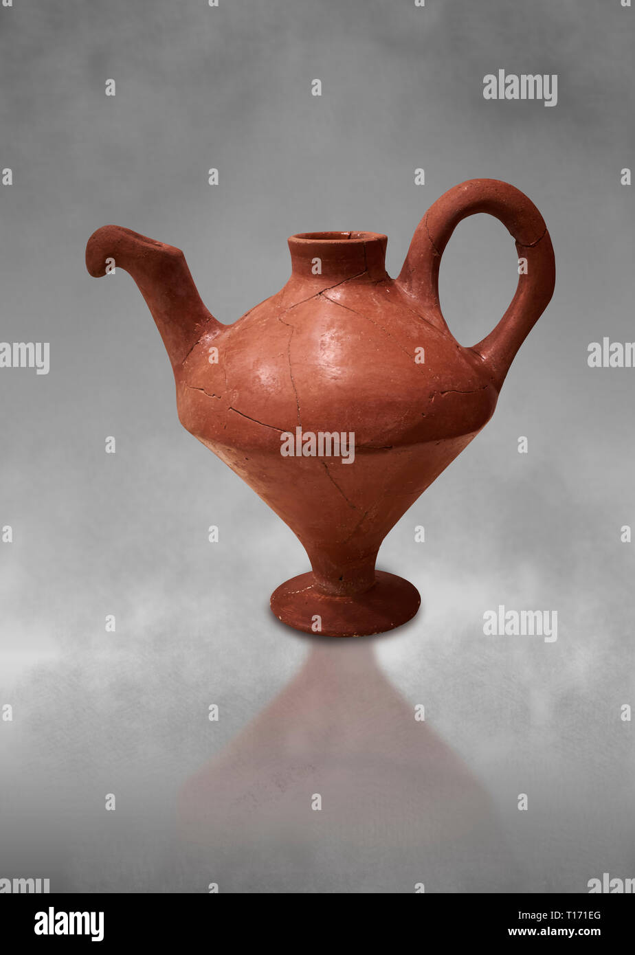 Hittite terra cotta side spouted teapot . Hittite Period, 1600 - 1200 BC.  Hattusa Boğazkale. Çorum Archaeological Museum, Corum, Turkey. Against a gr Stock Photo