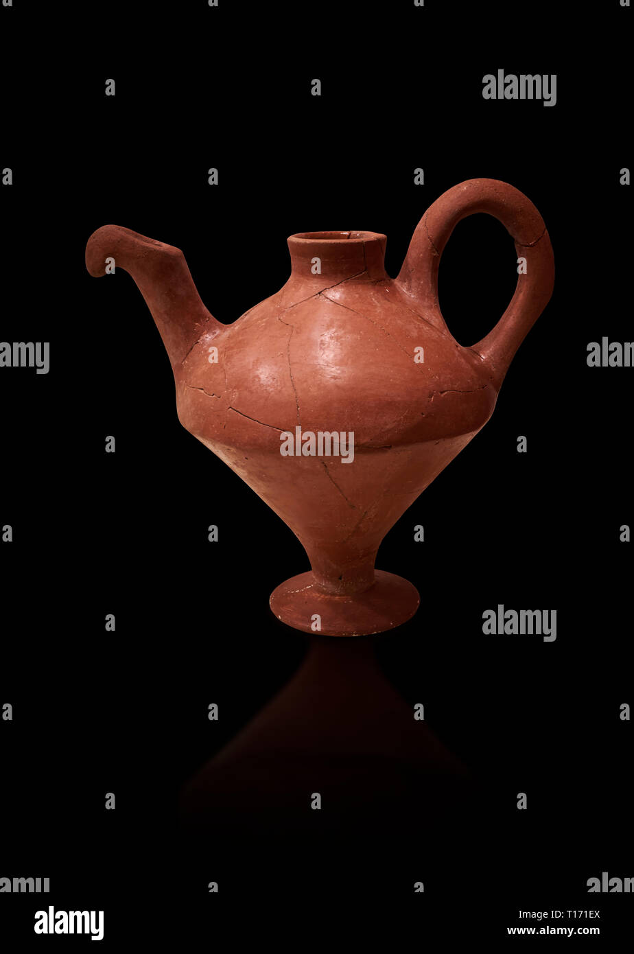 Hittite terra cotta side spouted teapot . Hittite Period, 1600 - 1200 BC.  Hattusa Boğazkale. Çorum Archaeological Museum, Corum, Turkey. Against a bl Stock Photo