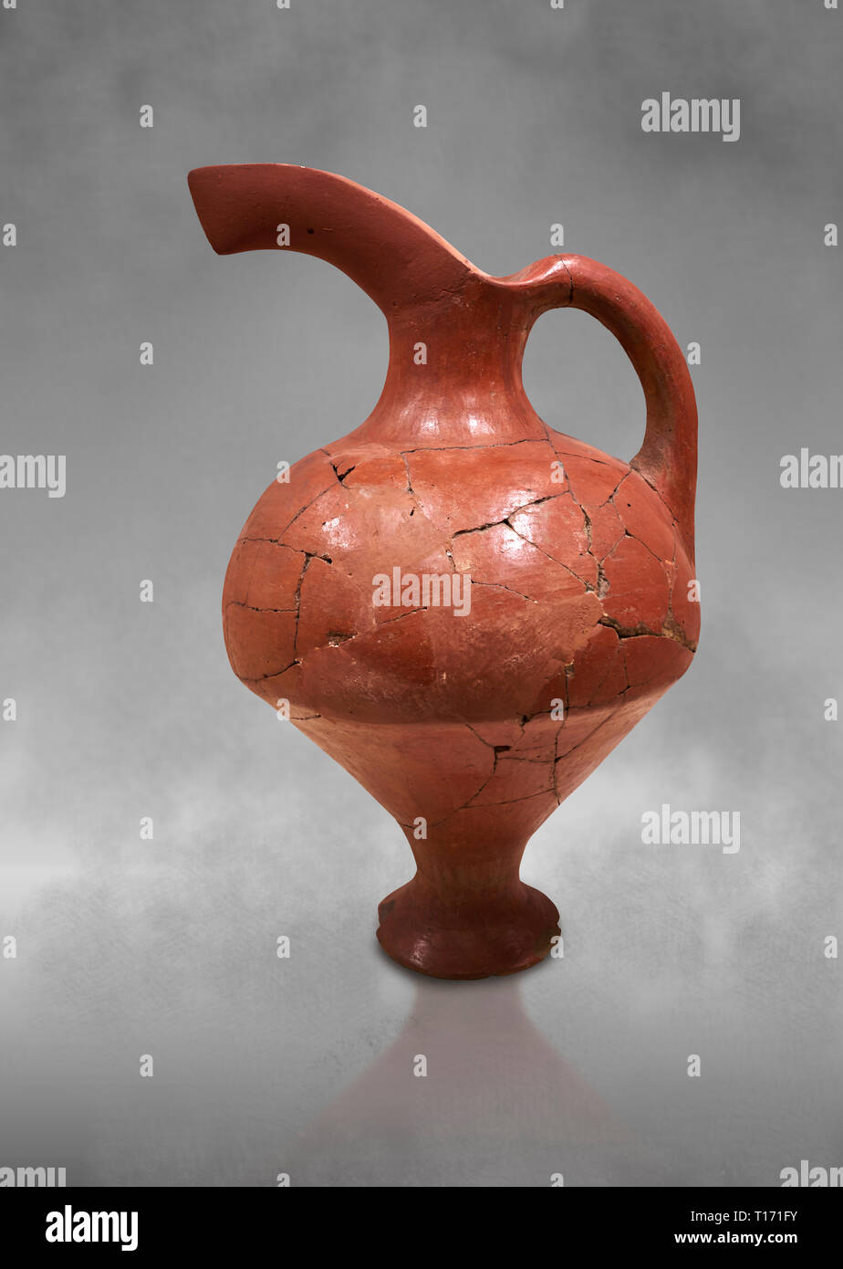 Hittite terra cotta red glazed beak spout pitcher . Hittite Period, 1600 - 1200 BC. Çorum Archaeological Museum, Corum, Turkey. Against a grey bacgrou Stock Photo