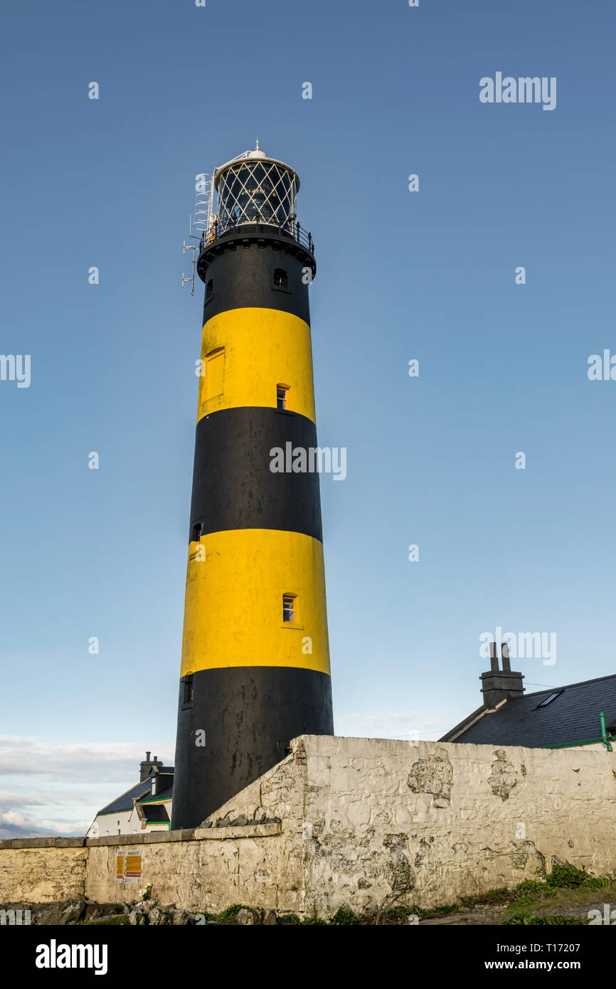 This is a picture of St John's Point Lighthouse  on the east coast of Northern Ireland on the Irish Sea.  It is one of Irelands many iconic coastal li Stock Photo