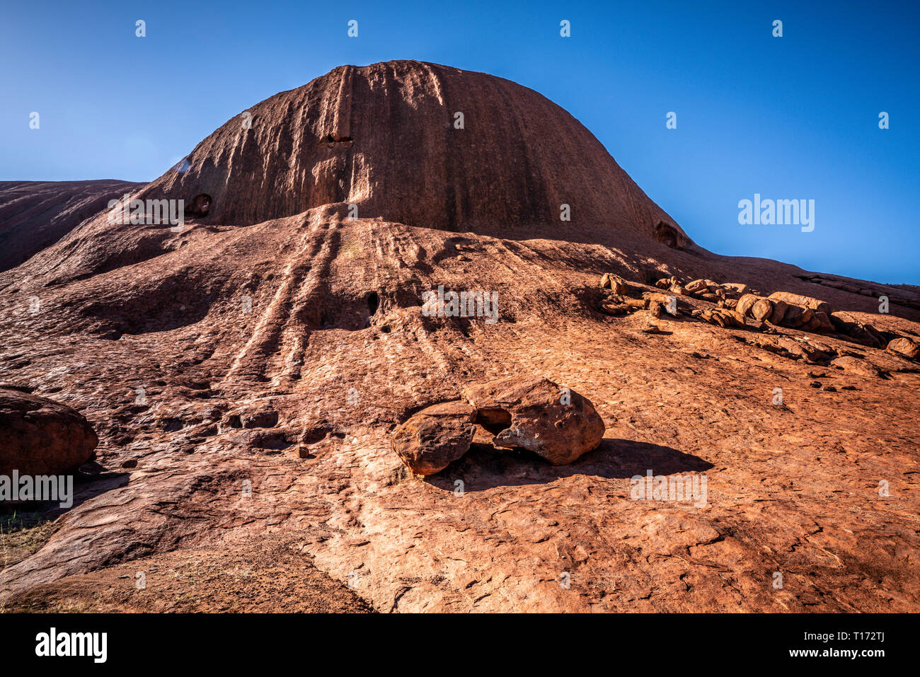 View of Kuniya Piti giant red rock during the Lungkata walk in NT outback Australia Stock Photo