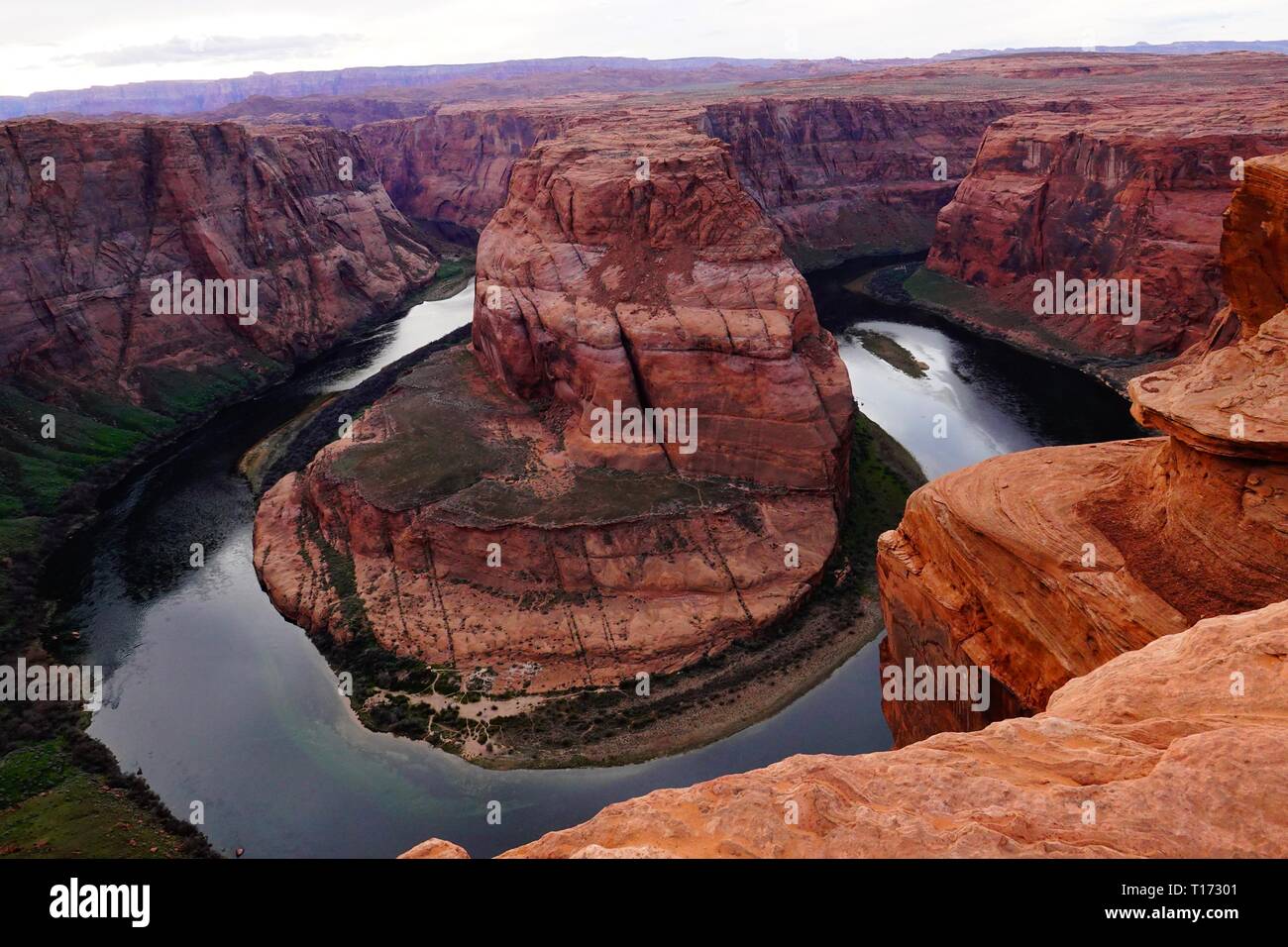 Horseshoe Bend is a horseshoe-shaped incised meander of the Colorado River located near the town of Page, Arizona, in the United States. Stock Photo