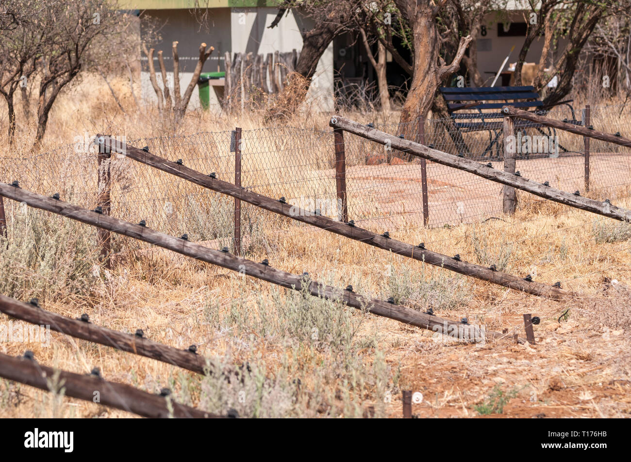 electrified fence, waterhole, Namibia Stock Photo