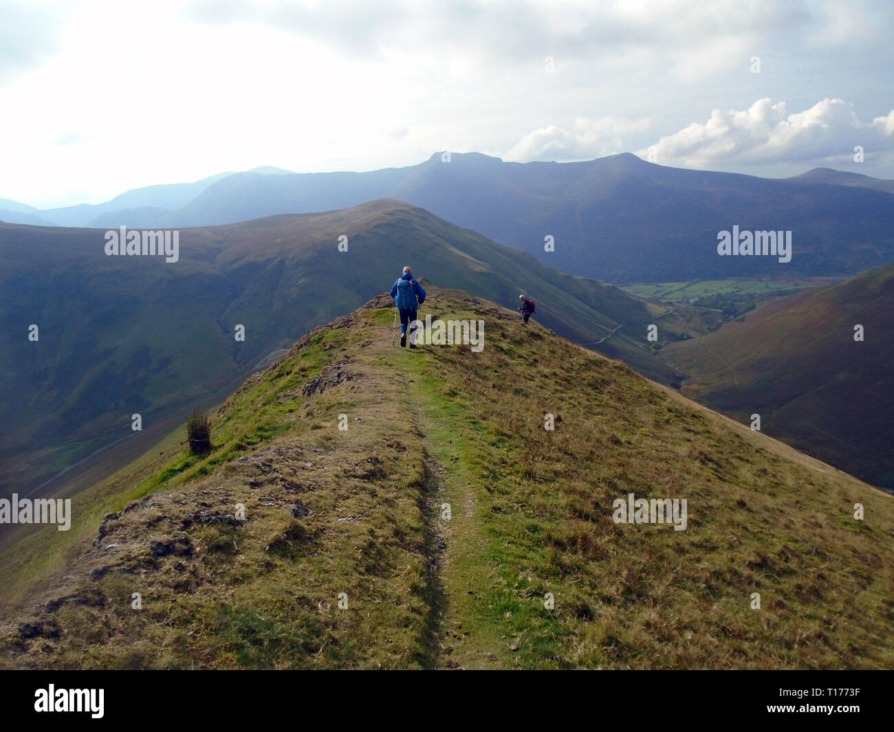 Two Hikers Walking on the Ridge Path on the Wainwright Ard Crags to ...