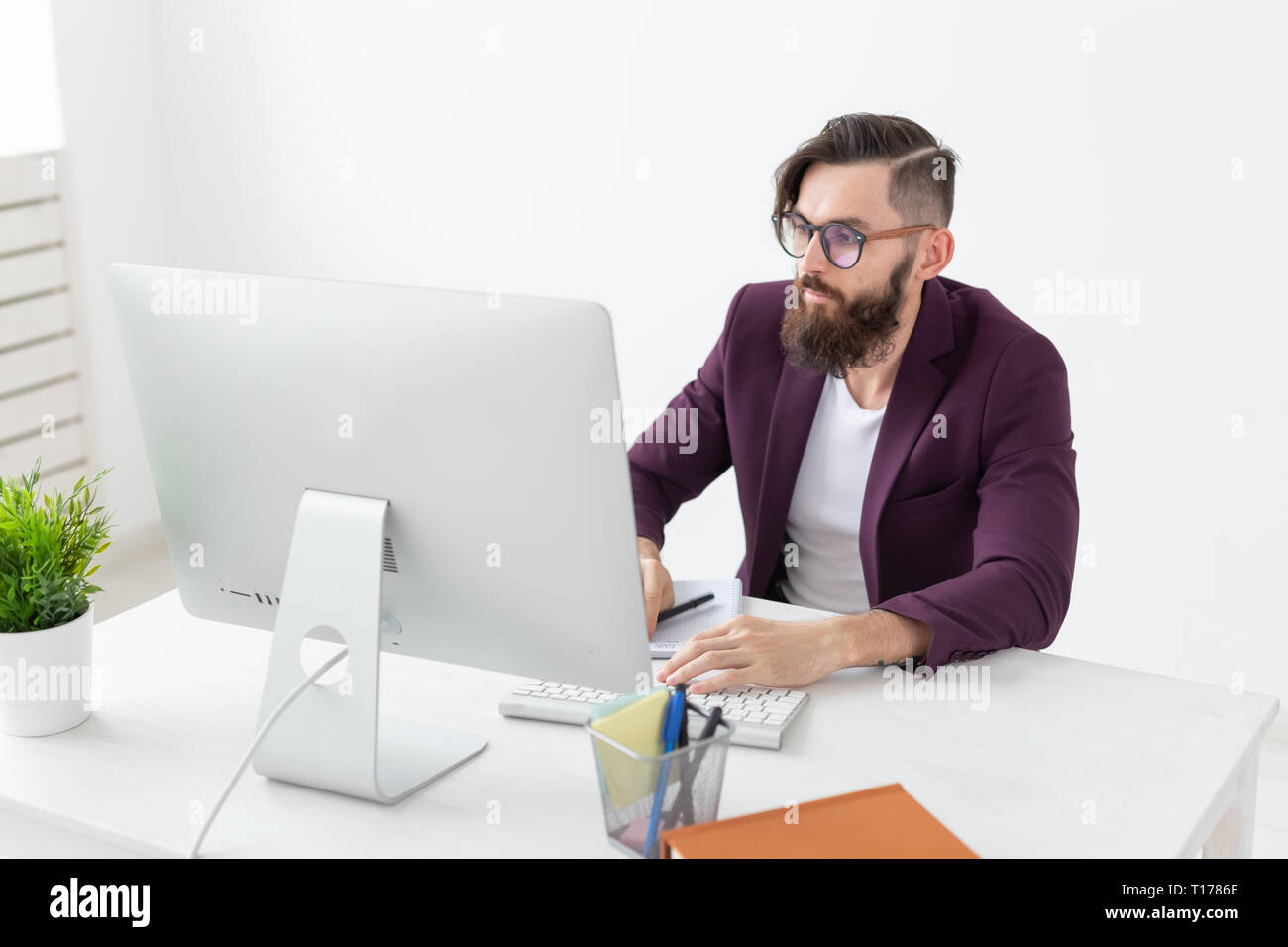people, design and style concept - graphic designer sketching new ...