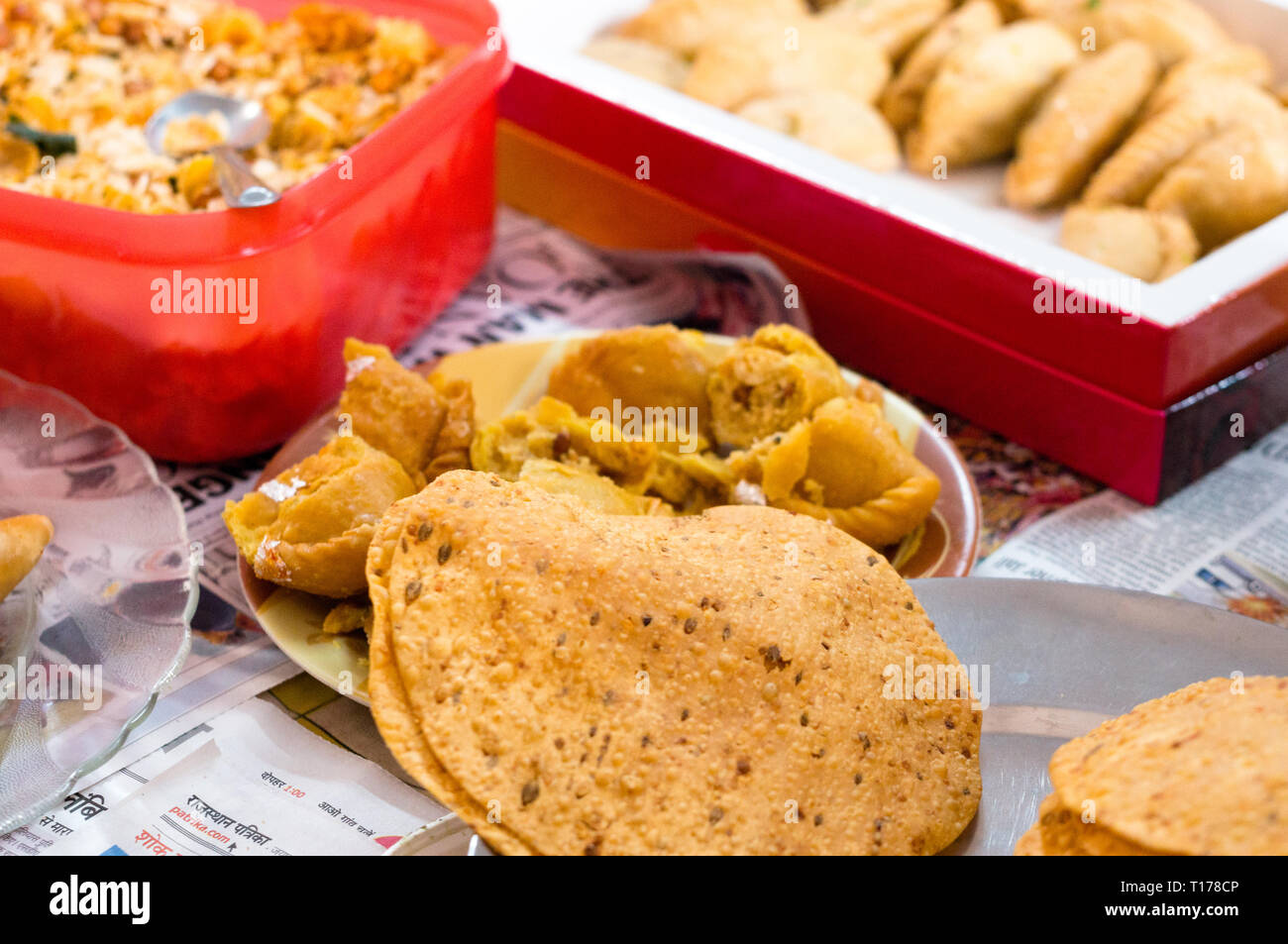 Mix of north indian snacks on the table in home Stock Photo Alamy