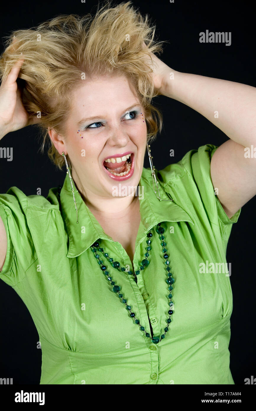 A young woman, crazy for joy. Stock Photo