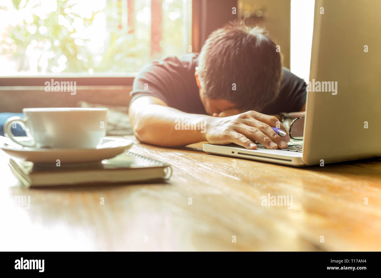 Working with laptop. лысый мужик за компьютером. девушка с ноутбуком на кровати. закрывает ноутбук гиф. A boy doing homework in front of his computer photo.