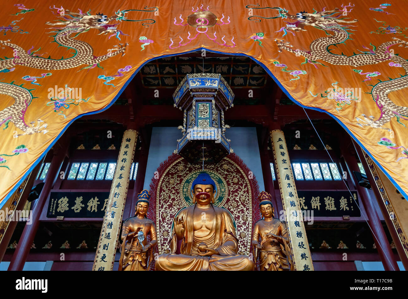 Hangzhou, China - August 14, 2011: View of Buddha statues inside Lingyin Temple. This temple is one of the most famous and visited spot of the city Stock Photo