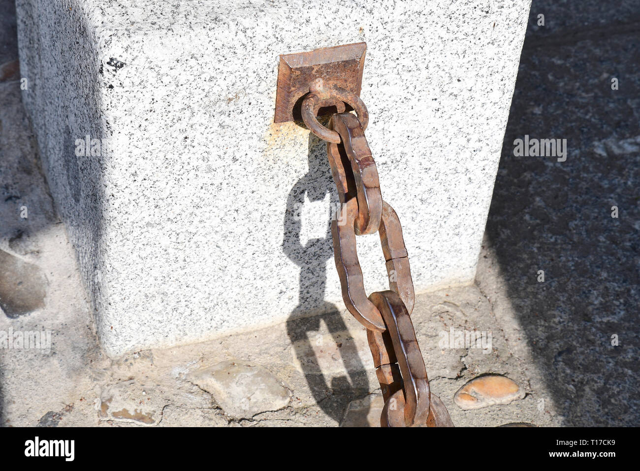Close up view of an old  grungy chain in the streets of Toledo, Sapain. Stock Photo