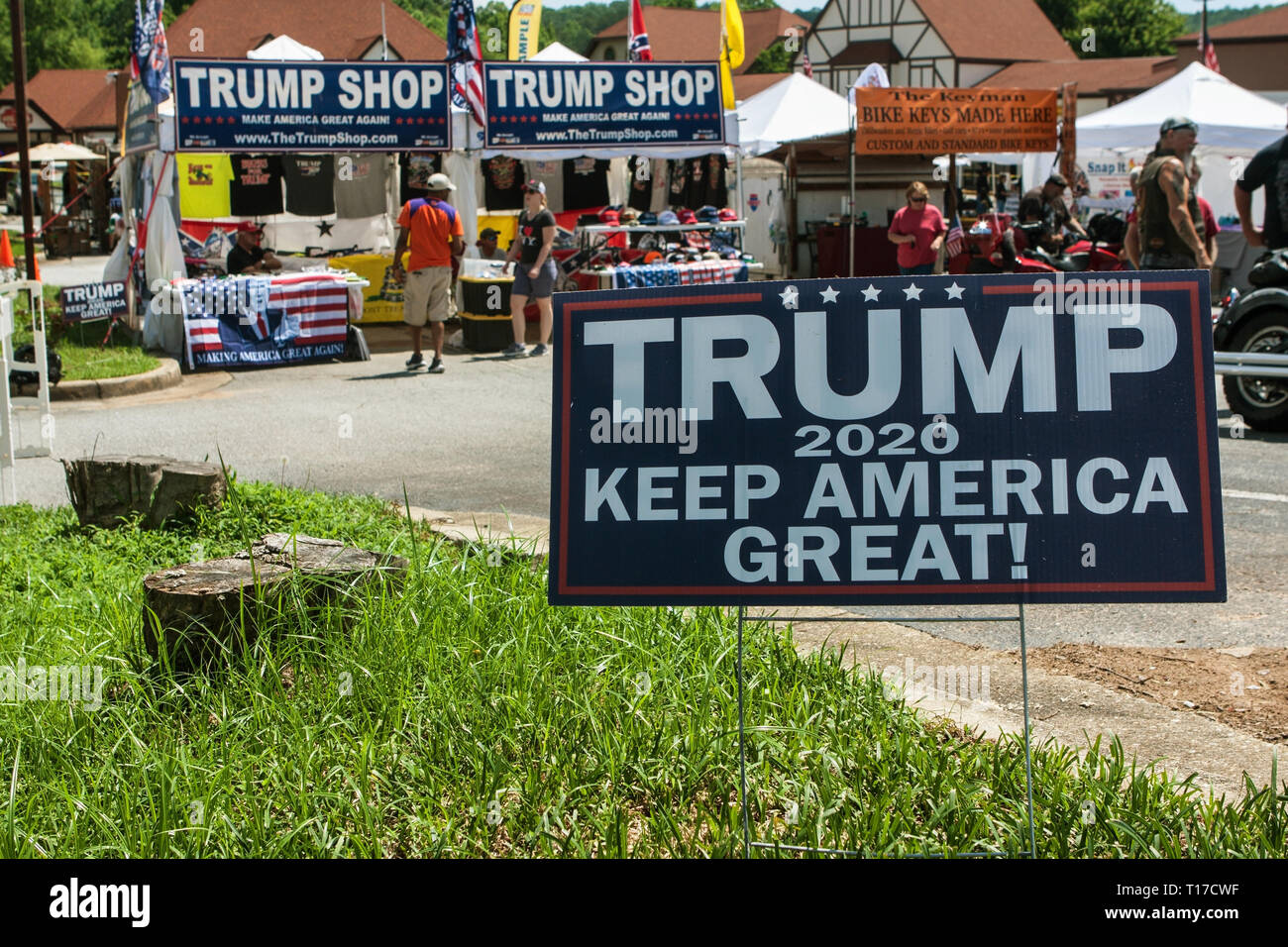 A Donald Trump 2020 presidential election campaign sign sits in the grass in front of the Trump Shop, a popup market in Helen, GA, on June 2, 2018. Stock Photo