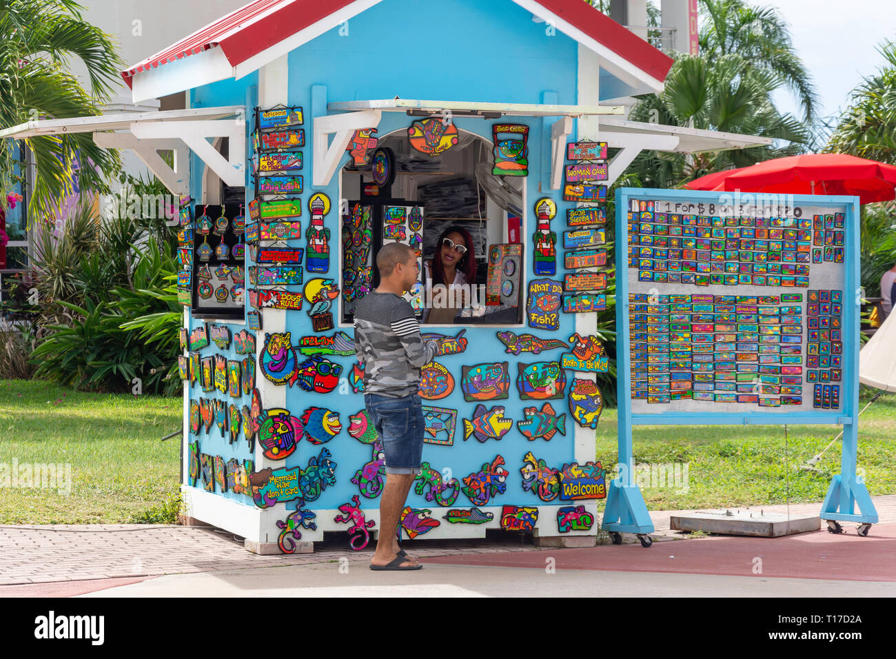 Souvenir magnets and signs kiosk at Harbor Point Village cruise port terminal, Philipsburg, St Maarten, Saint Martin, Lesser Antilles, Caribbean Stock Photo