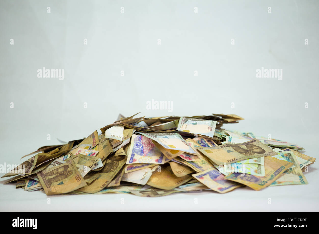 Spread of nigeria naira notes on white background Stock Photo