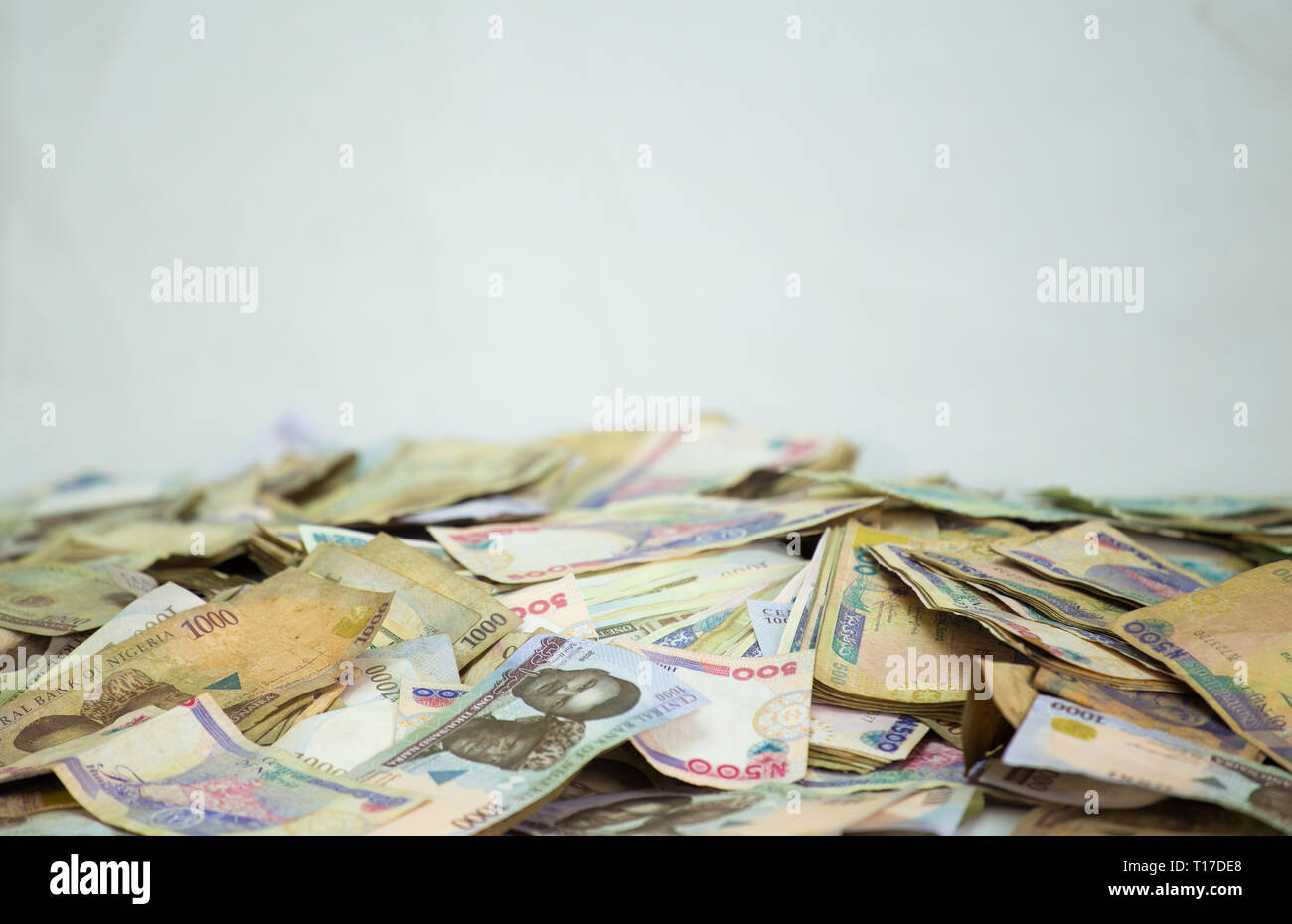 Heap of nigeria naira notes on white background Stock Photo