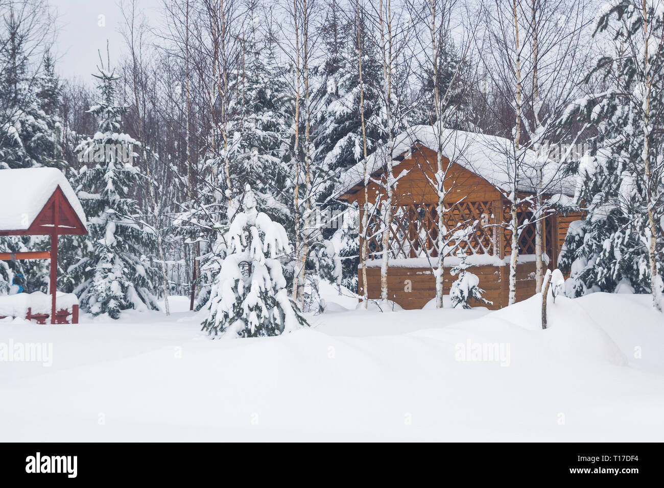 Wooden gazebo at a private house in the winter near the forest Stock ...