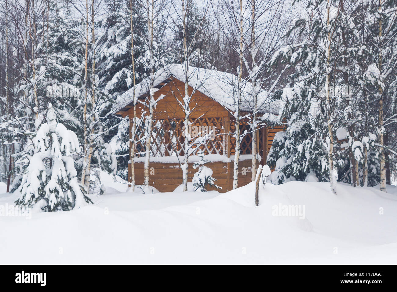 Wooden gazebo at a private house in the winter near the forest Stock ...