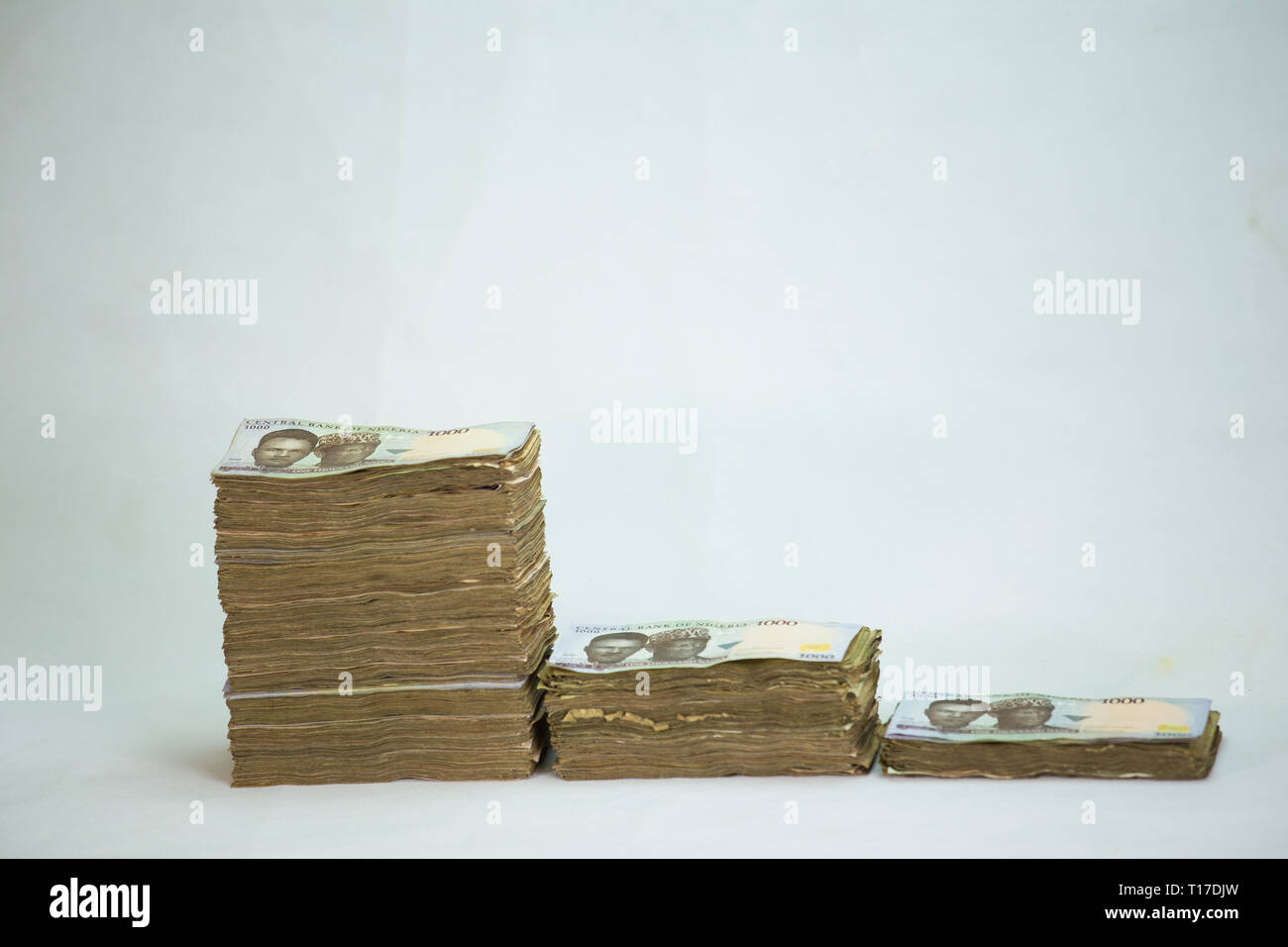 Stack of nigeria naira notes on white background Stock Photo