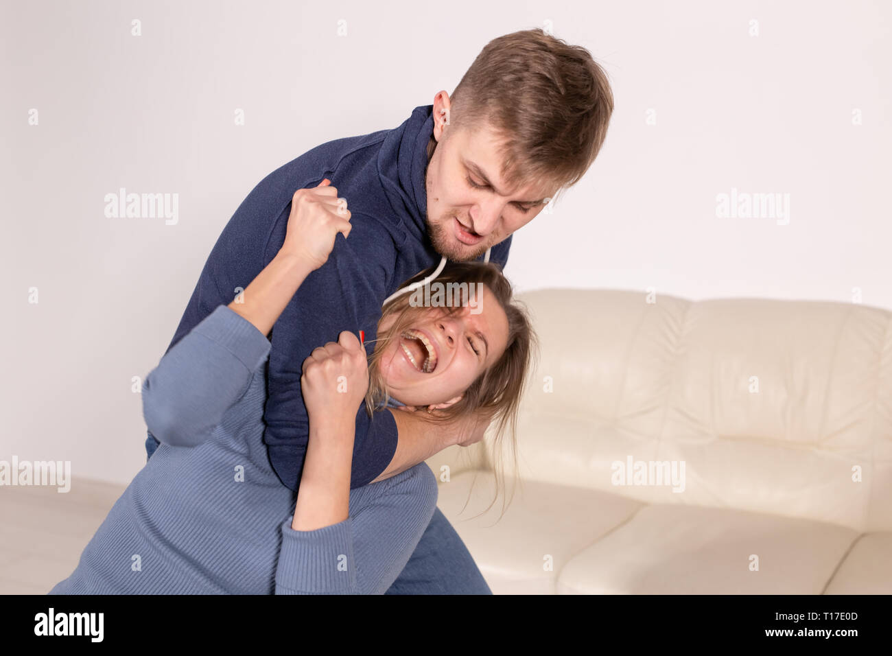 Beating woman hi-res stock photography and images - Alamy