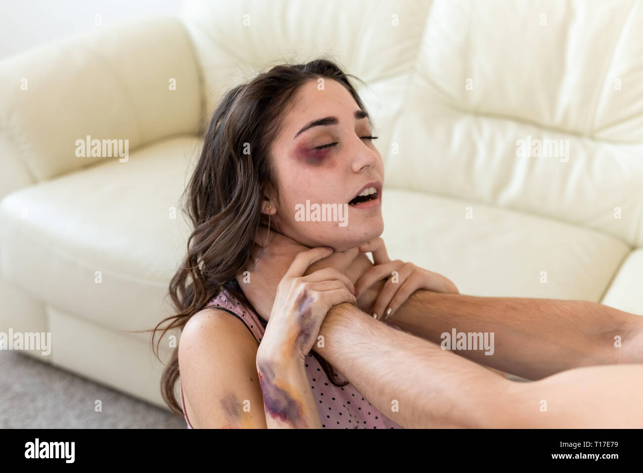 Victim, abuse and domestic violence - Woman being abused and strangled by  strong man Stock Photo - Alamy